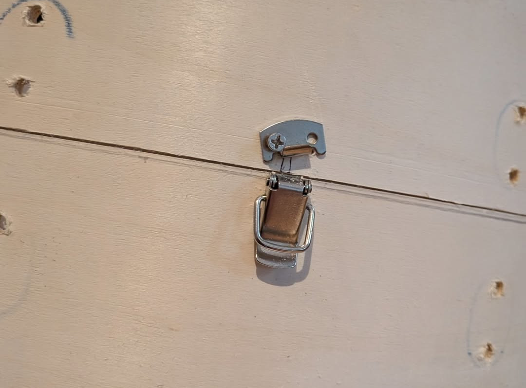 A latch fitted to help secure the nesting shell