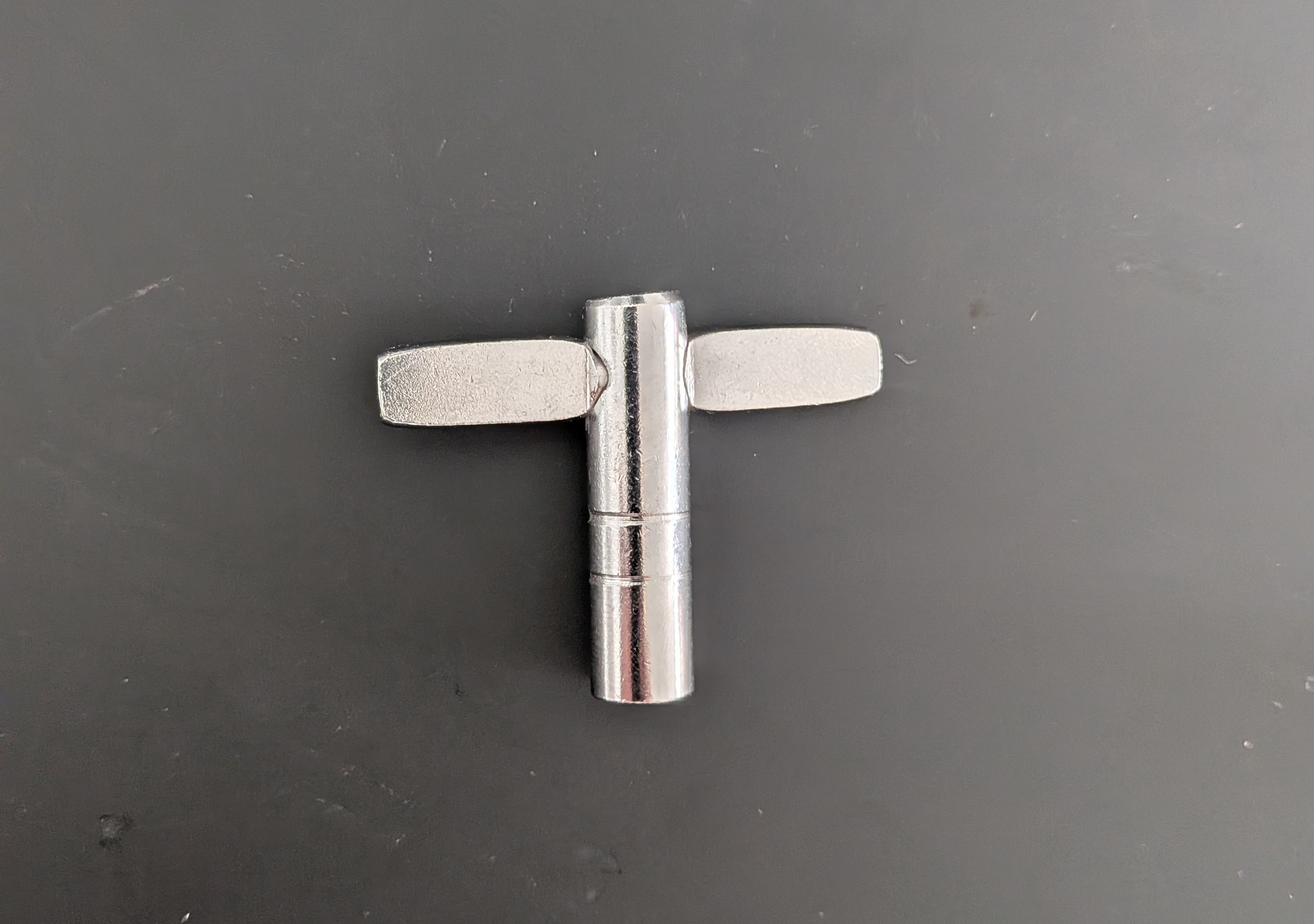 The spare drum key before modification