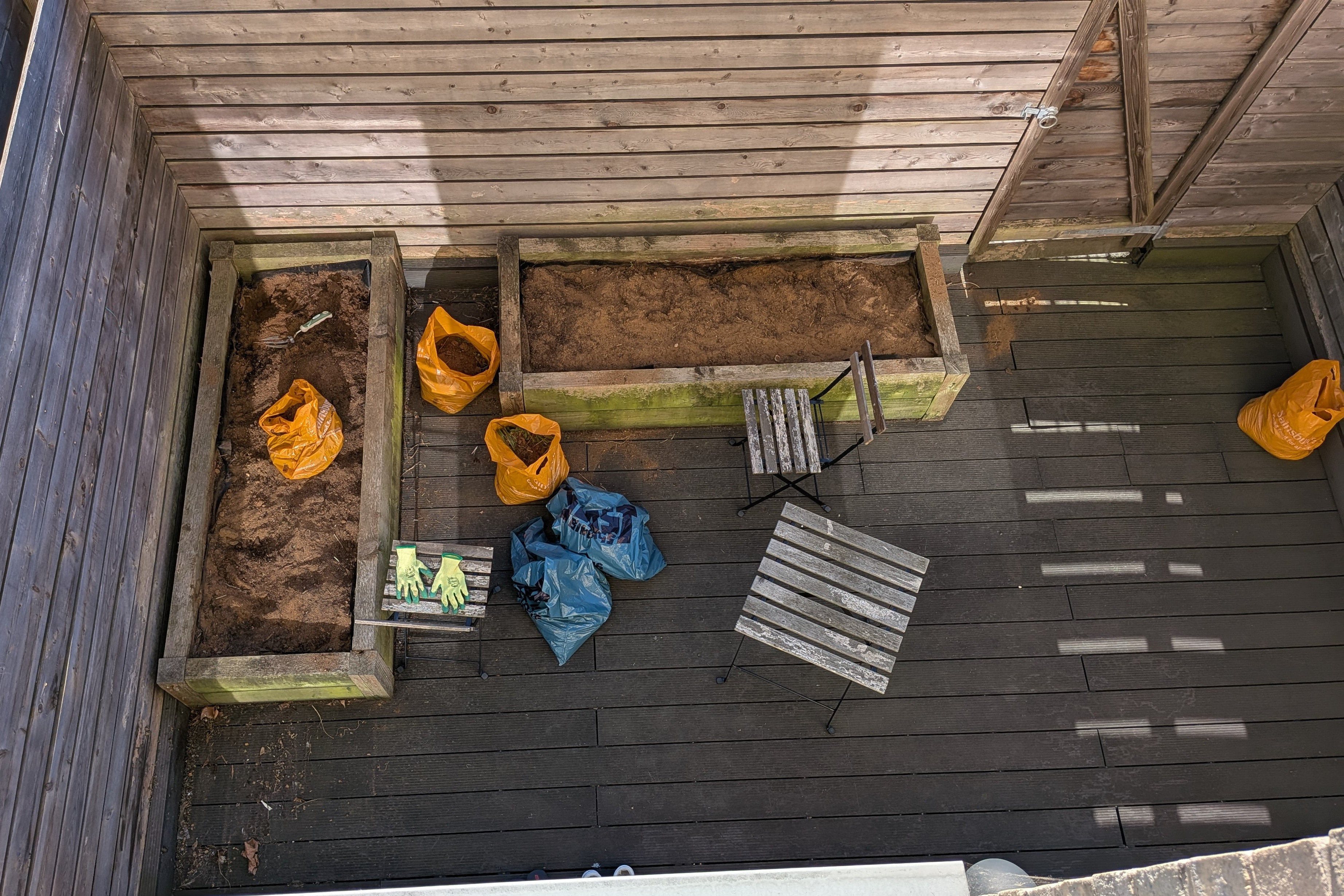 The garden planters after the weeds and old soil were removed