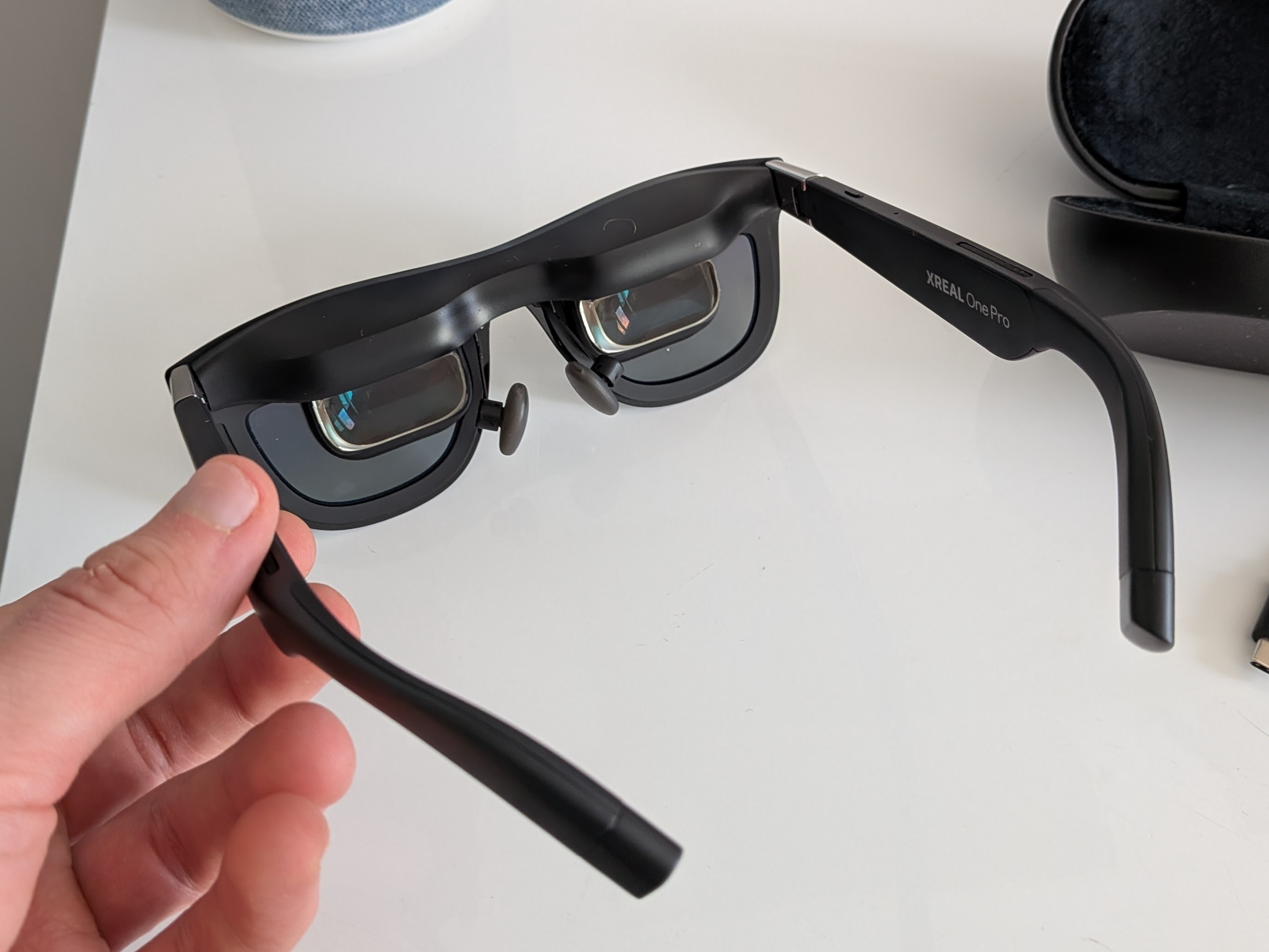 A pair of XREAL One Pro augmented reality glasses